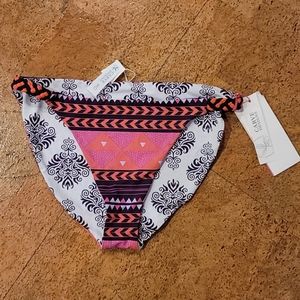 Women's reversable bikini bottom by Carve designs size Med.